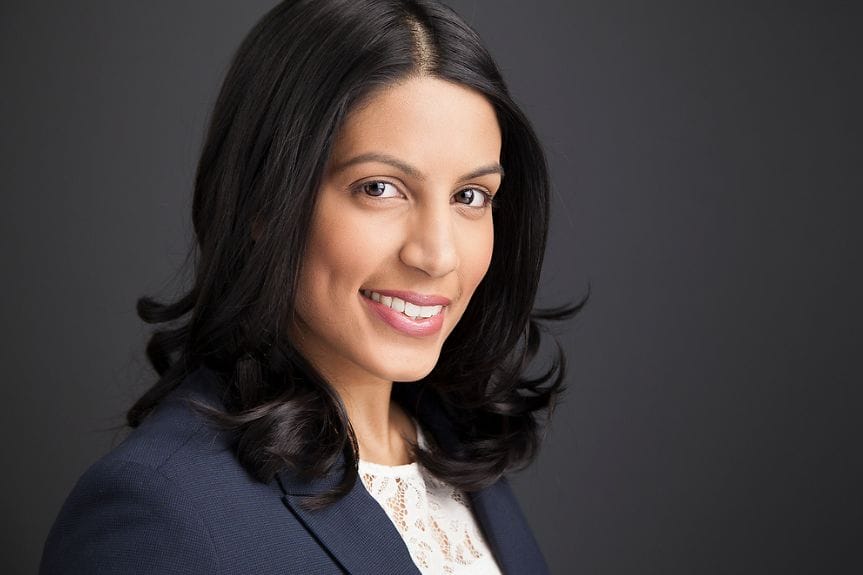 Example of a professional LinkedIn profile picture with clean background and polished attire