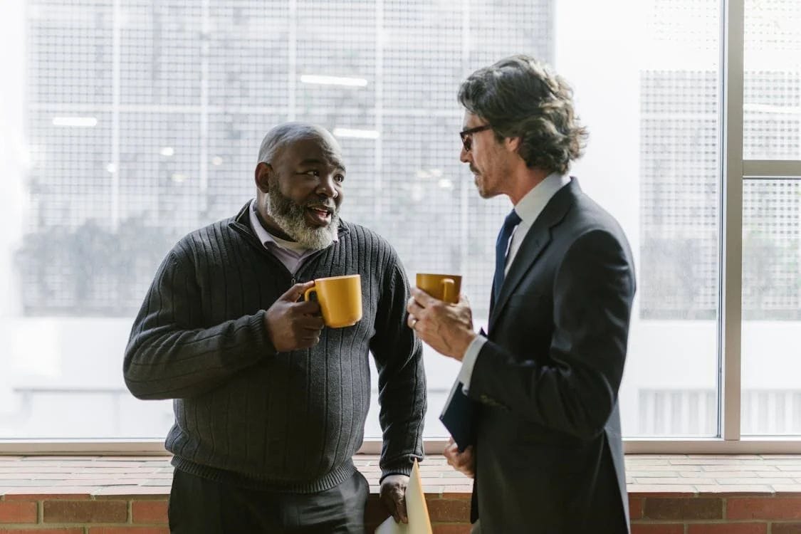 two businessemen talking